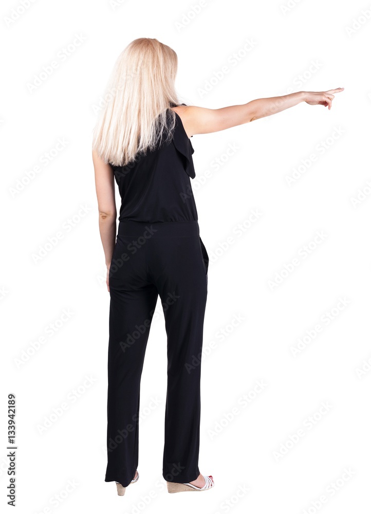 Back view of pointing woman. beautiful blonde gir Back view of pointing woman. beautiful blonde gir