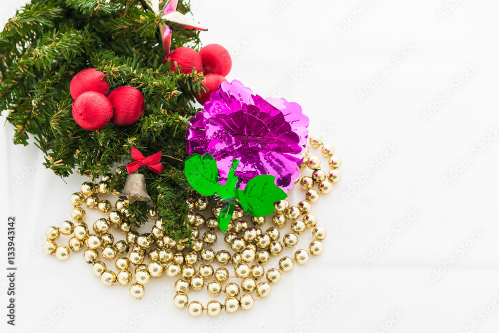 Christmas background with a red ornament, gift box, berries