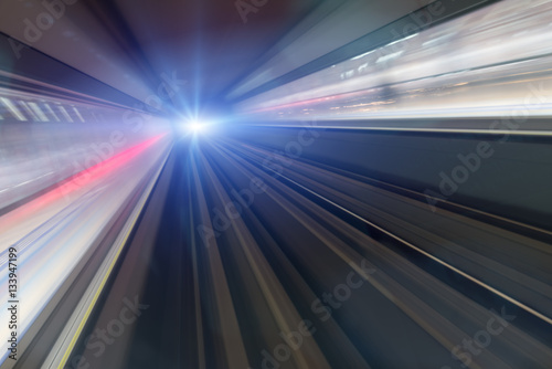 Train speeding in tunnel, motion blur
