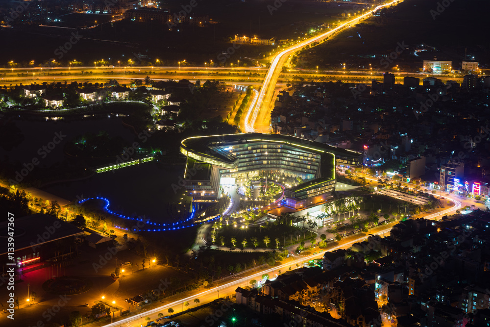 Aerial skyline view of Hanoi cityscape at twilight. Me Tri, Tu Liem district