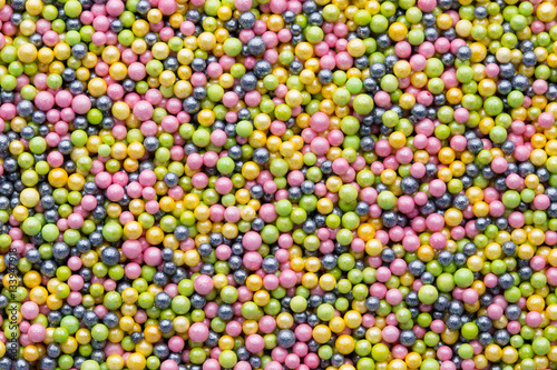 Multicoloured sweet sugar balls. Small ball pattern.