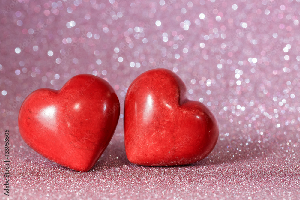 Fototapeta premium Valentine's day red hearts on a beautiful bokeh background. 