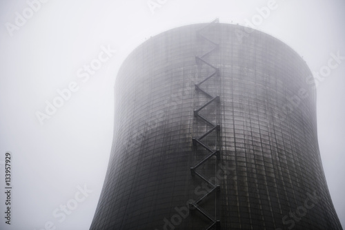 Low angle view of nuclear reactor in foggy weather