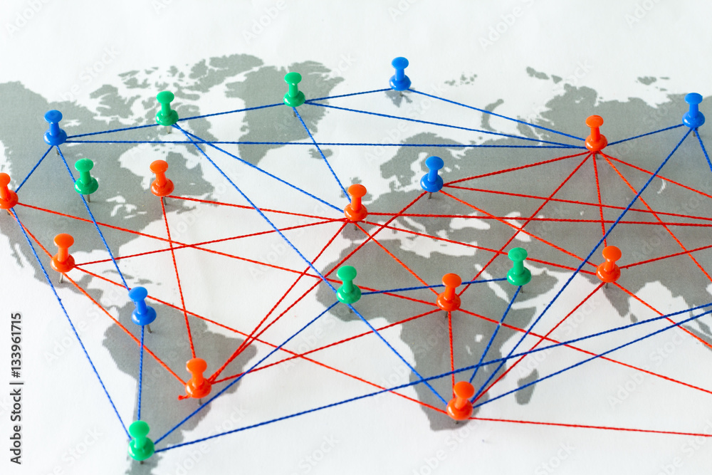 Map of the world connected by thumbtacks Map of the world connected by thumbtacks