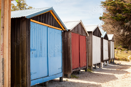 Boat sheds on the beach