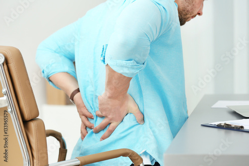 Young man suffering from ba...