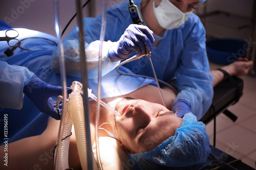 Operating of patient in mod...