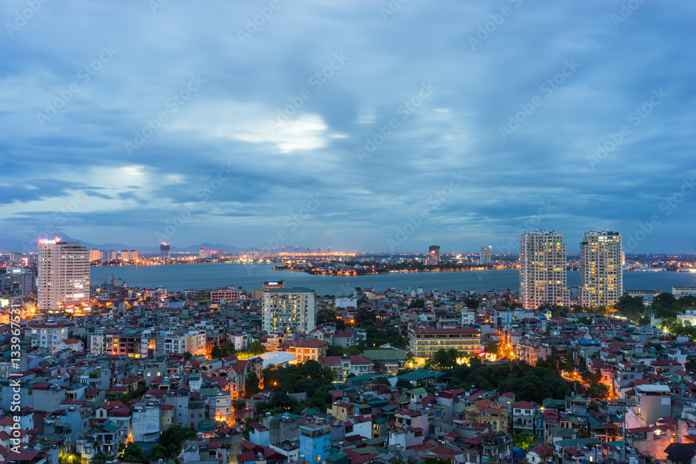 Aerial view of north West lake ( Ho Tay) in Tay Ho district. Hanoi cityscape at twilight