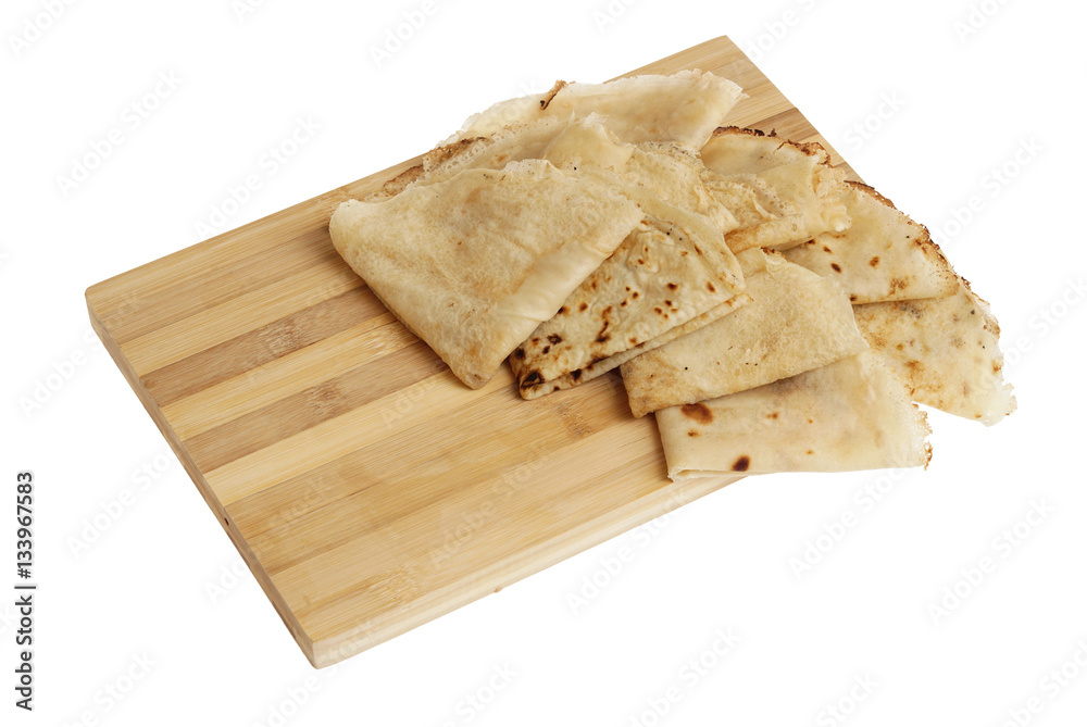 Freshly baked rolled blinis or crepes isolated