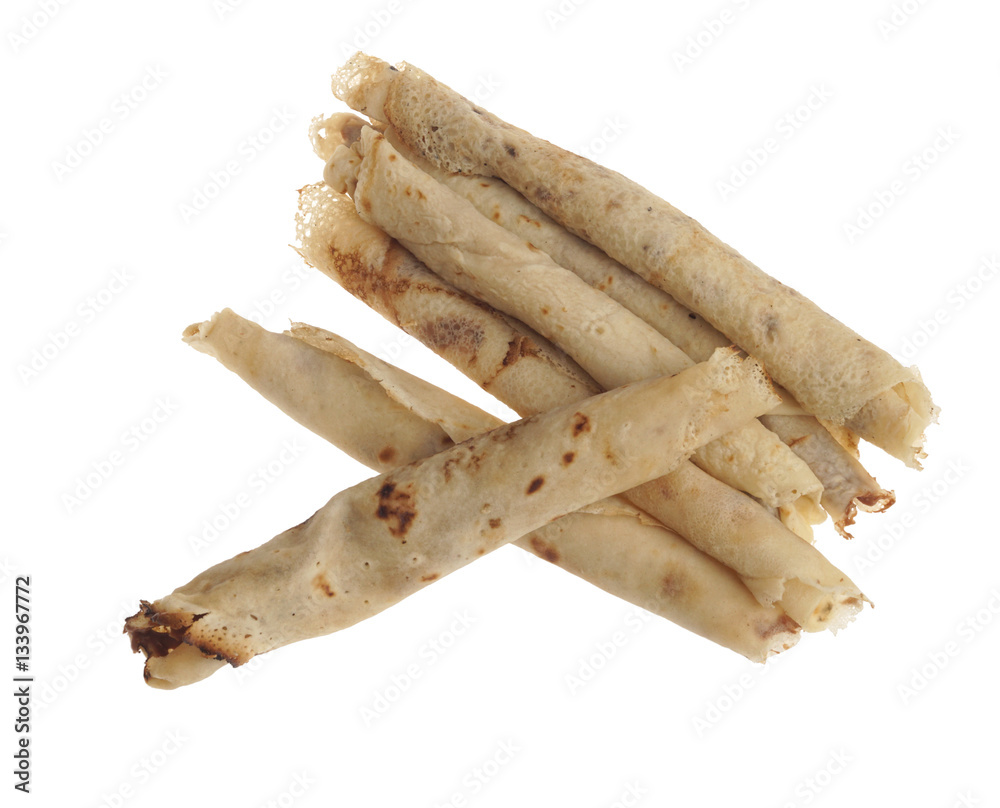 Freshly baked rolled blinis or crepes isolated