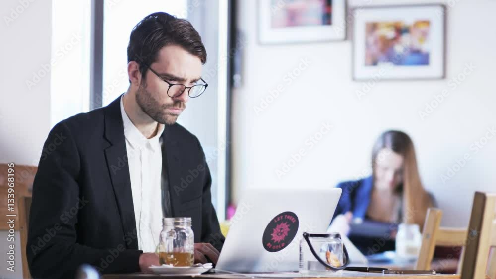 Young Businessman Focused on Work Young Businessman Focused on Work