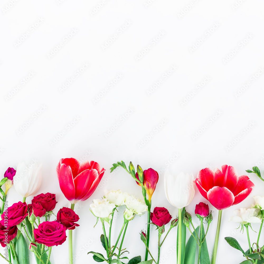 Fototapeta premium Pattern with spring flowers isolated on white background. Flat lay,
