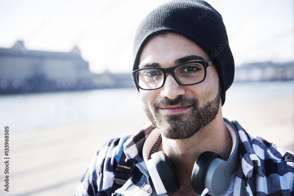 Close-up portrait of smiling man with headphone Close-up portrait of smiling man with headphone