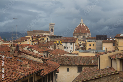 Red roofs and Florence Cathedral on background. Tuscany. Italy.