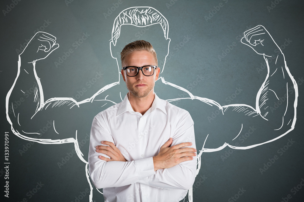 Young Confident Businessman With Arm Muscles Drawing