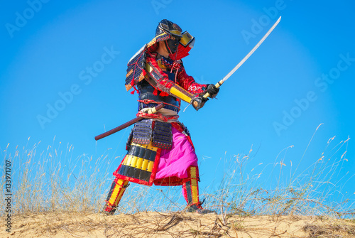 фотографія Men in samurai armour with sword. Original Character