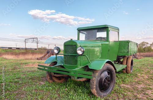 Vintage retro green truck in the field