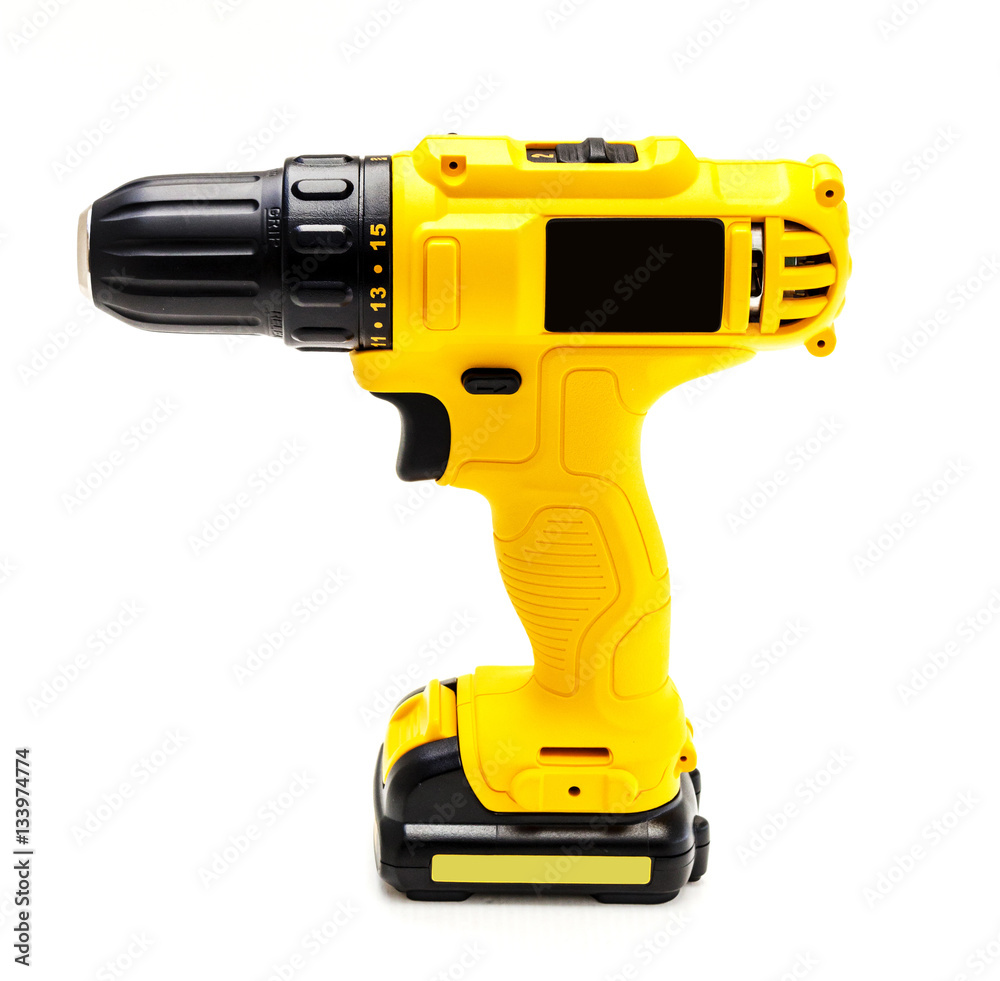 Electric drill cordless on white background