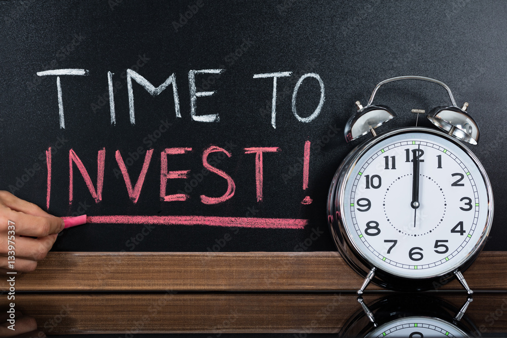 Time To Invest Concept Written On Blackboard