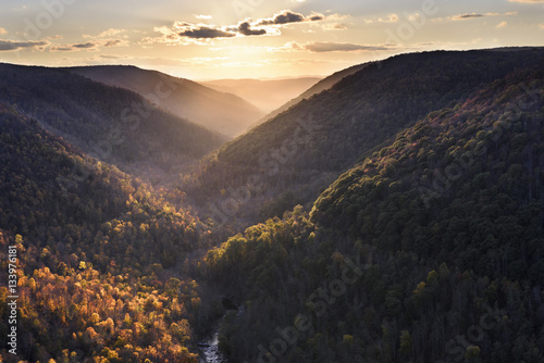 Sun Lighting Mountains in Fall Colors