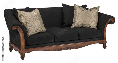 Black sofa with decretive pillows.