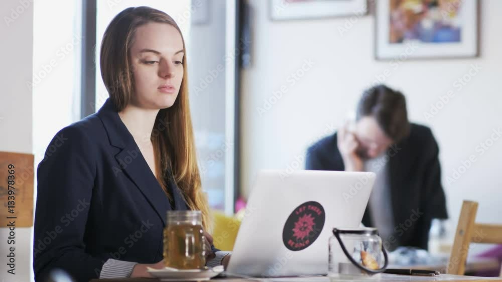 Young Businesswoman During an Important Skype Talk Young Businesswoman During an Important Skype Talk
