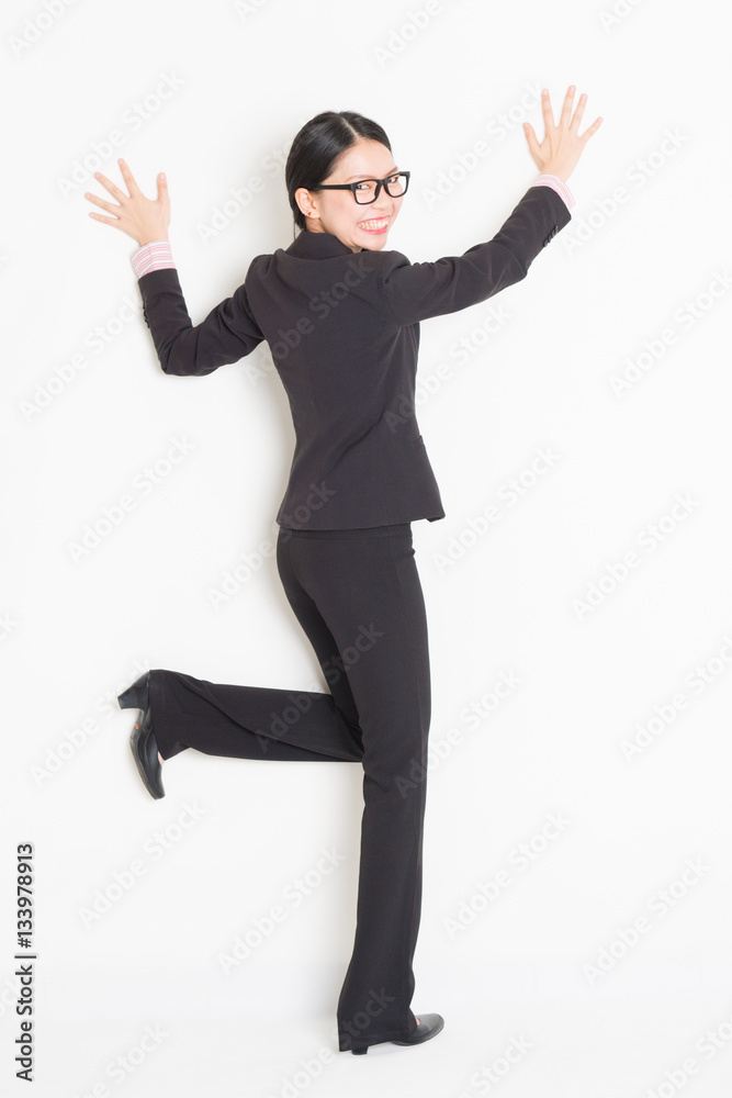 Asian businesswoman hands touching on wall Asian businesswoman hands touching on wall
