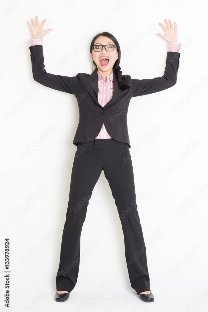 Shocked Asian businesswoman bang and leaning wall Shocked Asian businesswoman bang and leaning wall