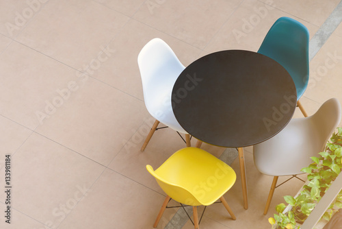 Top view of modern table and chairs photo