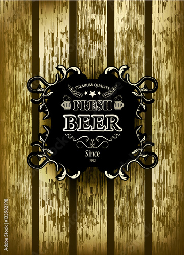 old-fashioned retro label beer on a wooden background