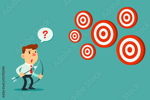 businessman with bow and arrow look at multiple targets