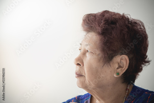 Portrait of smiling senior woman with copyspace