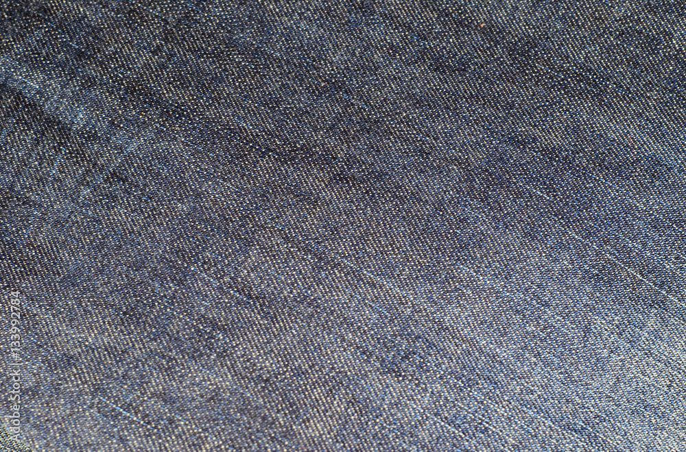 Texture of a blue jeans. Fabric background Texture of a blue jeans. Fabric background