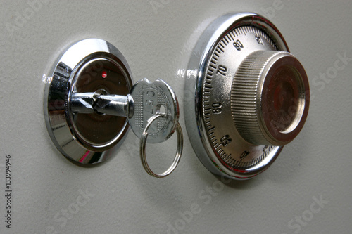 Combination lock on small home fire safe to protect documents and valuables from fire and burglary.