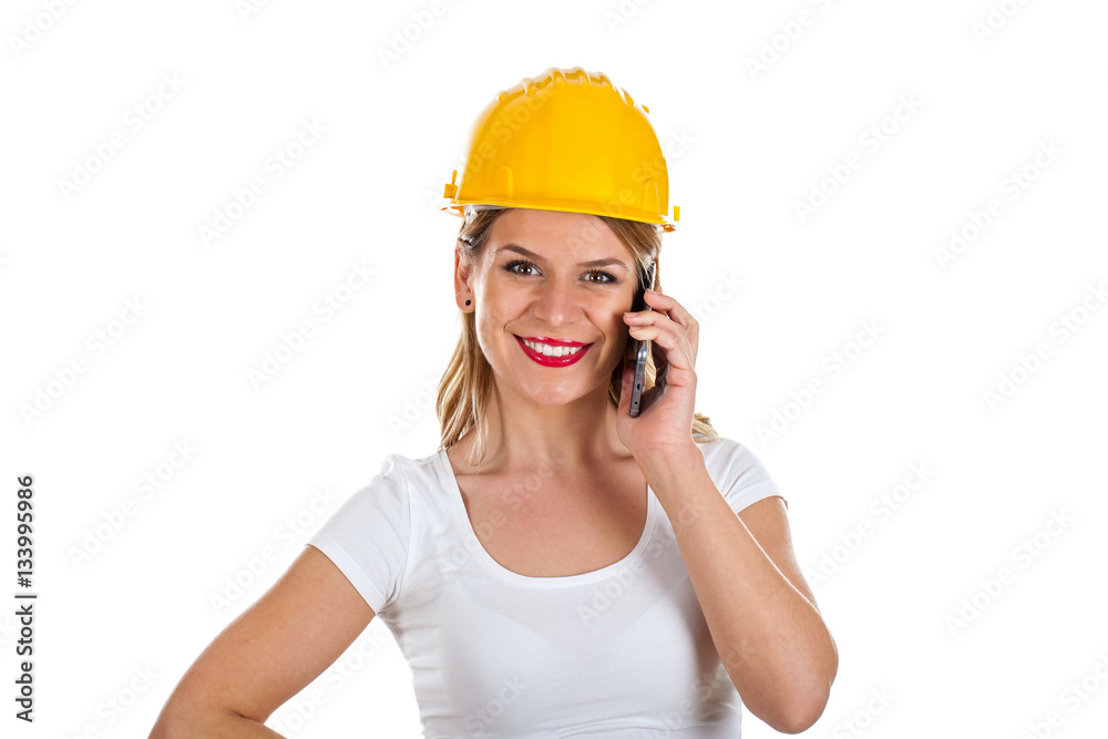 Beautiful female engineer on the phone