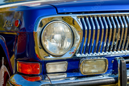 Closeup of old retro car headlight