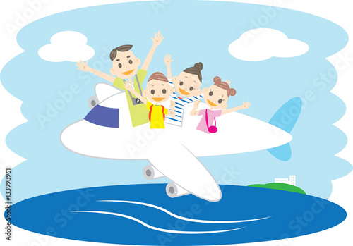 飛行機で旅行に出かける家族