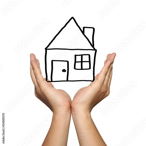 Symbol of house on hand of a businessman in concept of advertisi