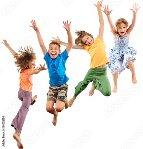 group of happy barefeet cheerful sportive children jumping and dancing