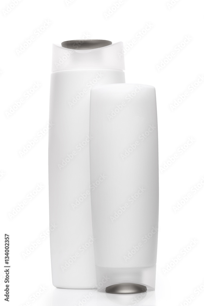 Two Shampoo bottles isolated on white background Two Shampoo bottles isolated on white background