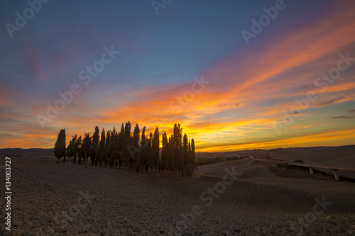 beautiful, colorful clouds during sunset over Tuscany