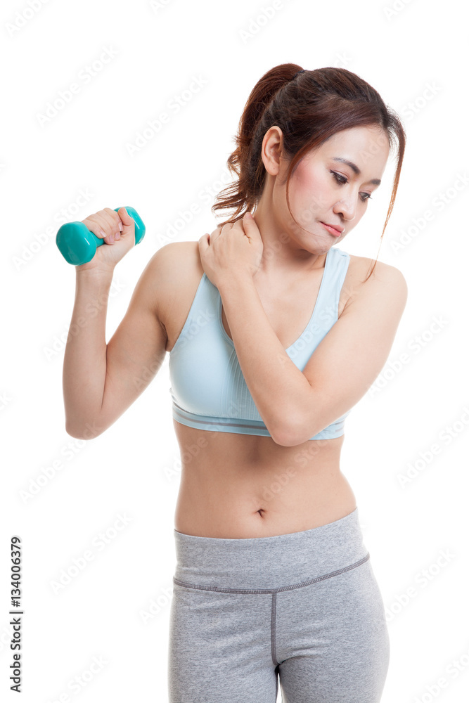 Asian healthy girl got shoulder pain with dumbbell. Asian healthy girl got shoulder pain with dumbbell.