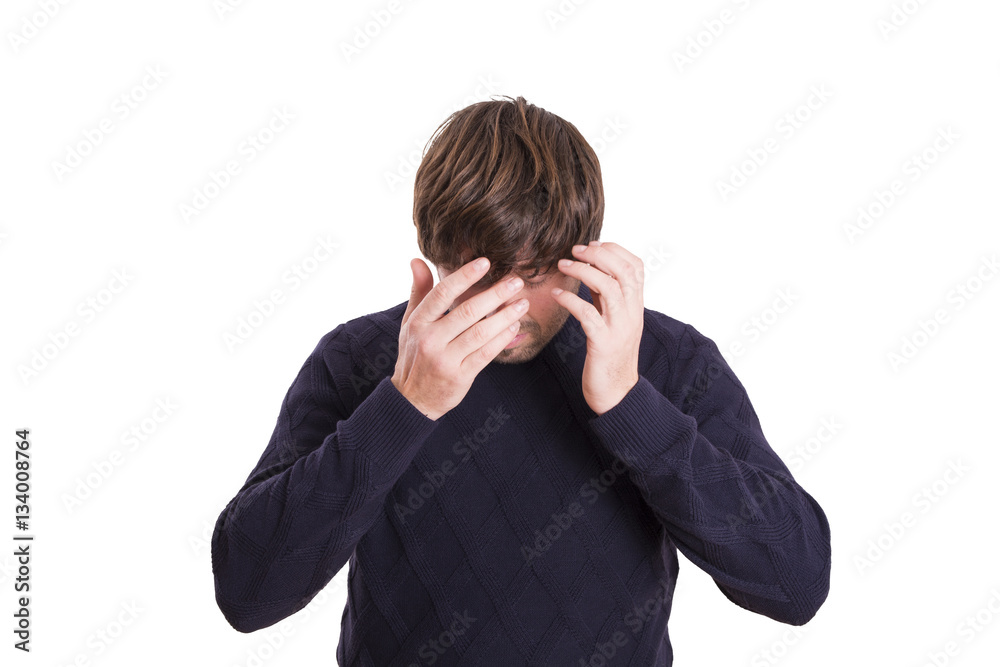young funny man covering his face. disagree expression. young funny man covering his face. disagree expression.
