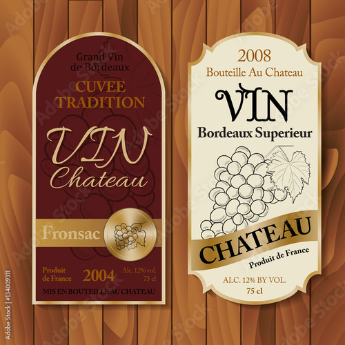 Vintage wine labels on wooden background