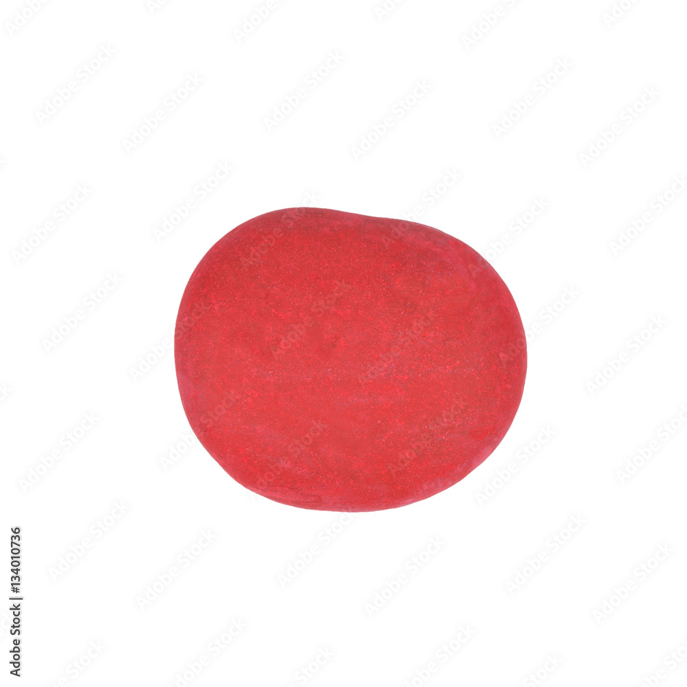 Obraz na plátně A red painted pebble stone isolated on a white background