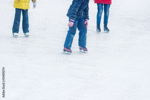 boy and two girls skate