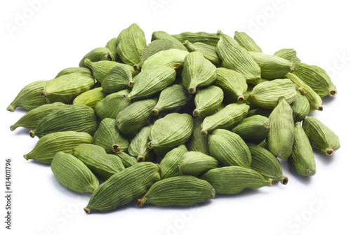 Pile of dried green cardamom pods, paths