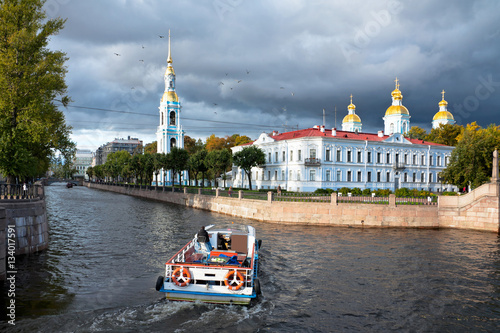 St. Petersburg. Kryukov Canal and St. Nicholas Naval Cathedral at typical cloudy weather (Nikolskiy morskoy sobor) photo