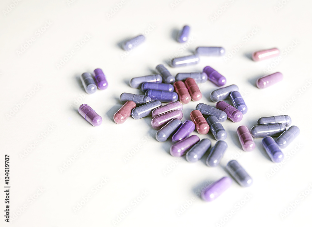 Different color of capsule pills use in pharmaceutical manufacturing, drug, medicine, garlic oil, fish liver oil. Different color of capsule pills use in pharmaceutical manufacturing, drug, medicine, garlic oil, fish liver oil.