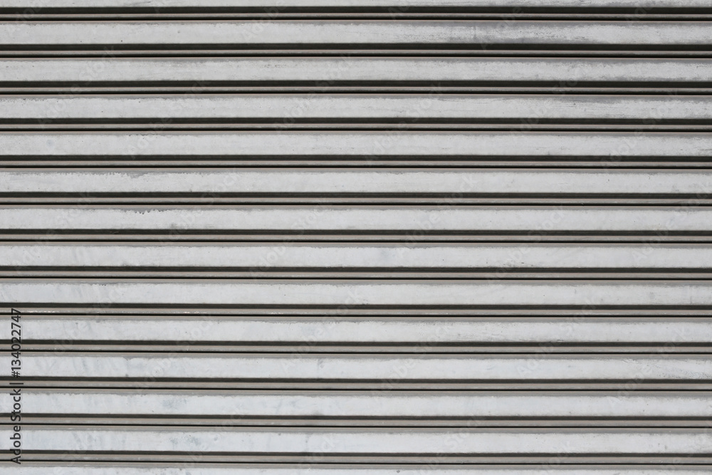 Old Steel door of Commercial Building for design background. Old Steel door of Commercial Building for design background.